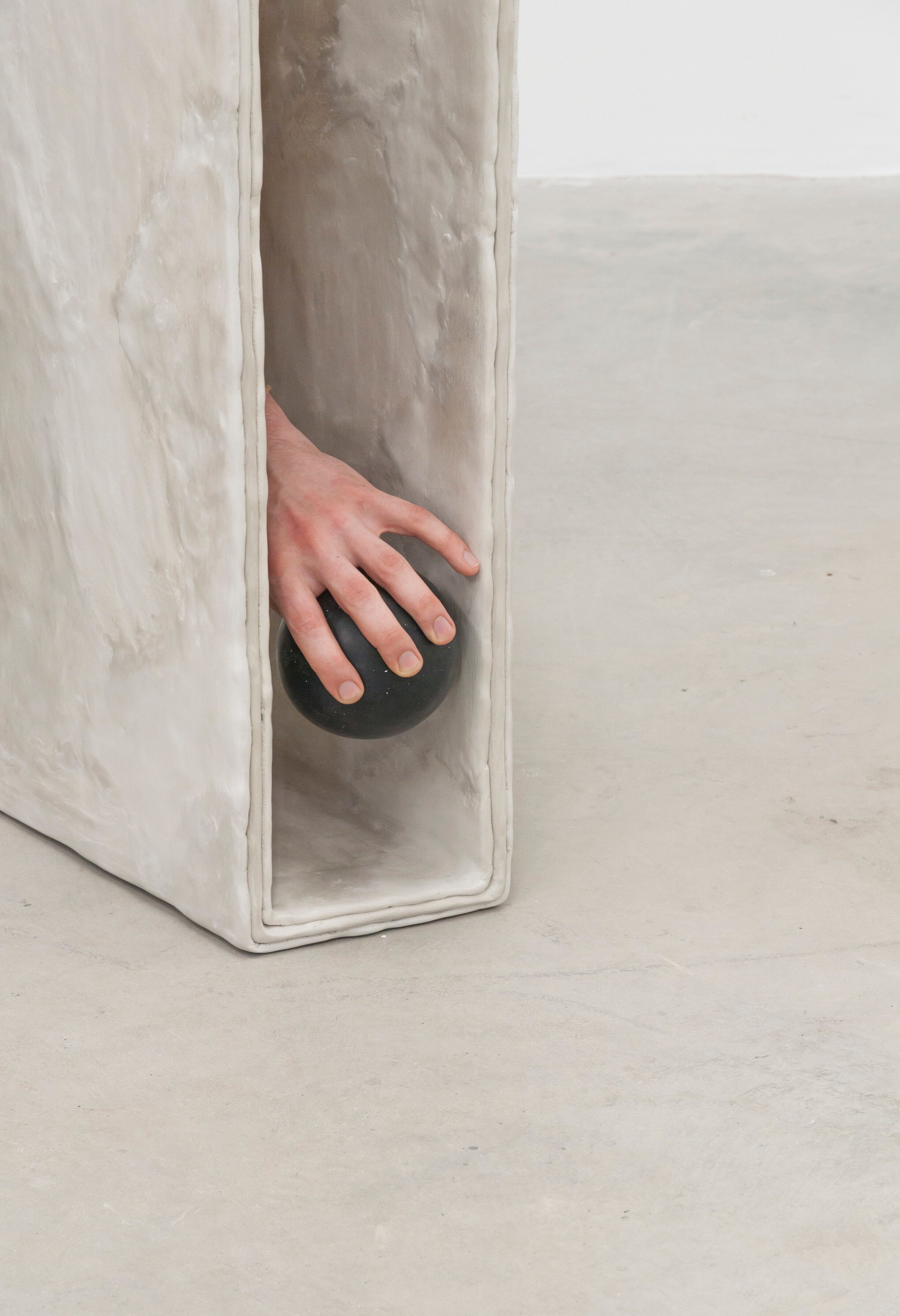Minimalist hand sculpted designer side table by artist Bailey Fontaine. Represented by design gallery Tuleste Factory in New York City.