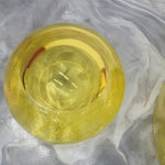 Chic and playful side table or transparent resin stool by artist Ian Alistair Cochran. Available through collectible design gallery Tuleste Factory in New York City.