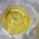 Chic and playful side table or transparent resin stool by artist Ian Alistair Cochran. Available through collectible design gallery Tuleste Factory in New York City.