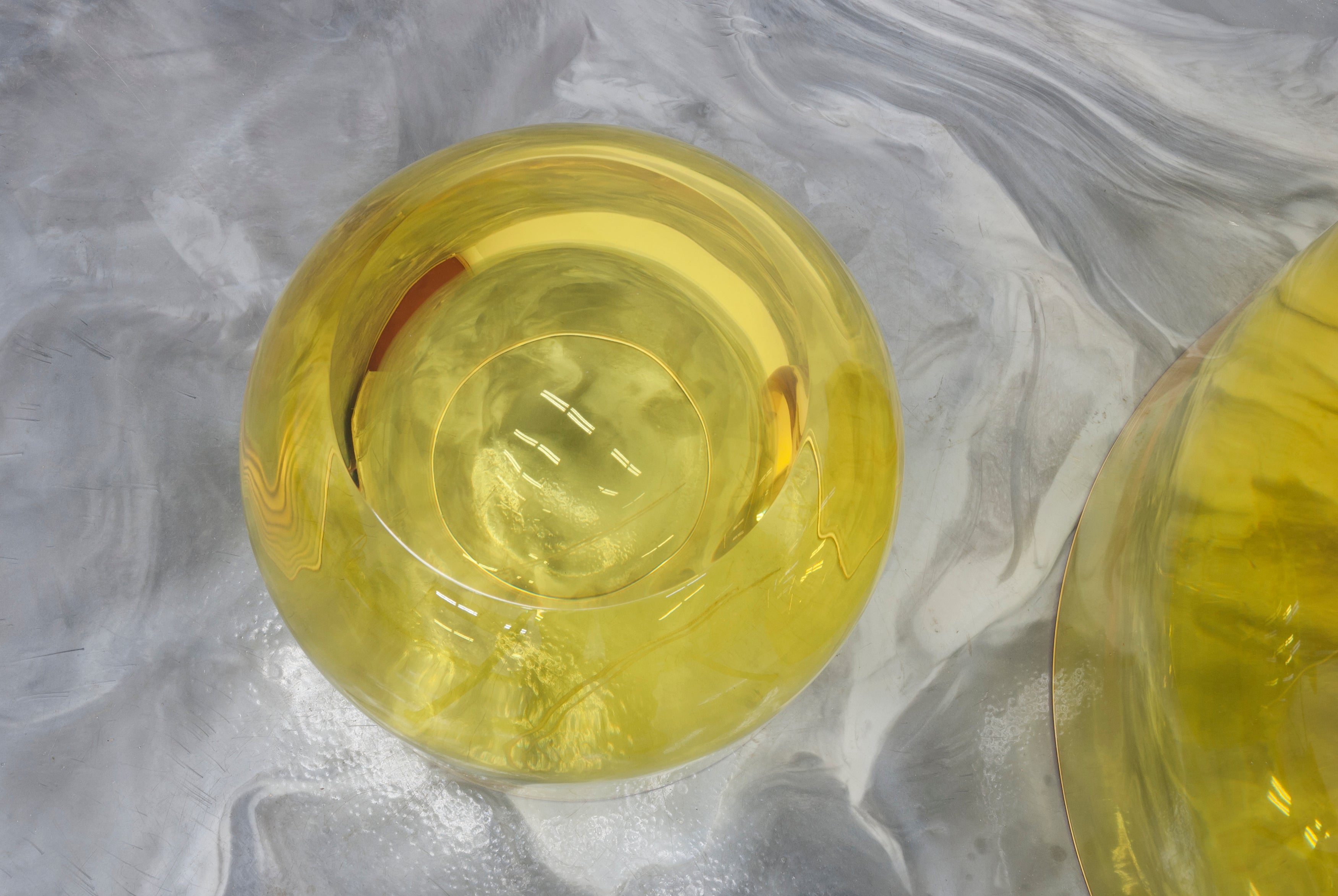 Chic and playful side table or transparent resin stool by artist Ian Alistair Cochran. Available through collectible design gallery Tuleste Factory in New York City.