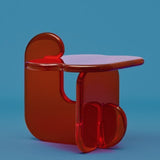 Contemporary and playful transparent side table in resin by Ian Alistair Cochran. Represented by collectible design gallery Tuleste Factory in Chelsea, NYC.