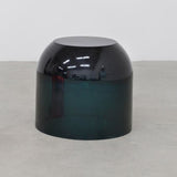 Close up detail of chic and playful side table or transparent resin stool by artist Ian Alistair Cochran. Available through collectible design gallery Tuleste Factory in New York City.