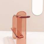 Contemporary and chic transparent resin console in pink by artist Ian Alistair Cochran. Represented by collectible design gallery Tuleste Factory in New York City.