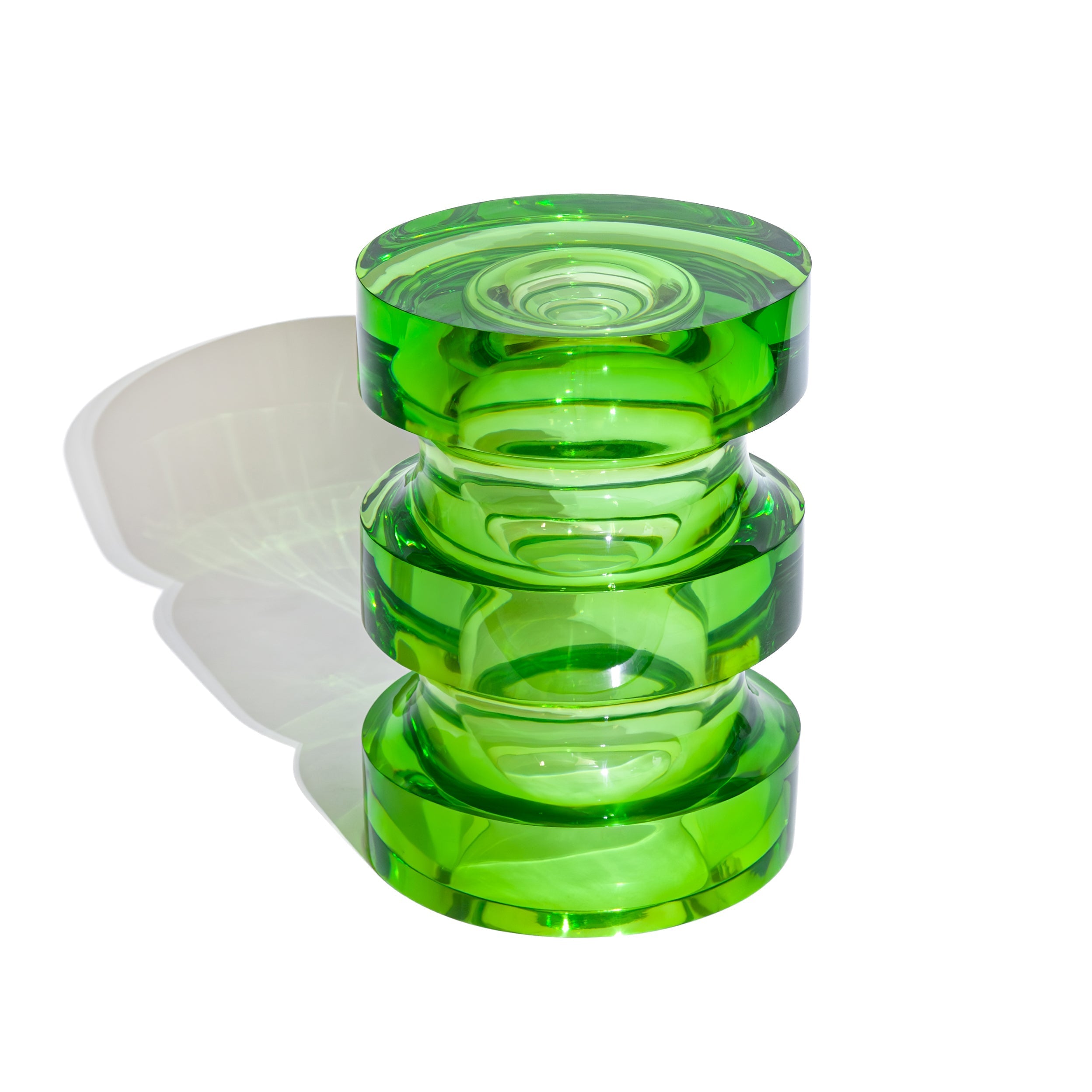 Green side table made from solid cast resin by Ian Cochran. Represented by Tuleste Factory, an art & design gallery in Chelsea, New York city.
