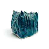 Turquoise Ceramic Heat Reactive Vessel