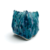 Turquoise Ceramic Heat Reactive Vessel