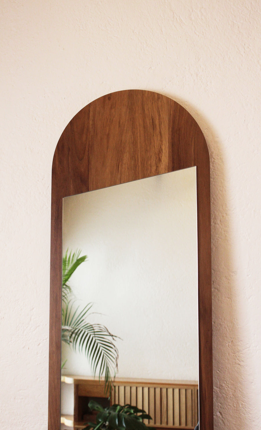 Tall contemporary designer standing mirror by Mexico based designer Maria Beckmann. Represented by collectible design Gallery Tuleste Factory in New York City.