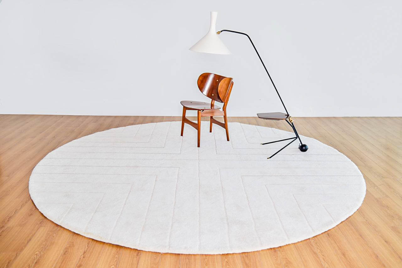 Luxury geometric relief rug by designer Jt/ Pfeiffer. Represented by Tuleste Factory in New York City.
