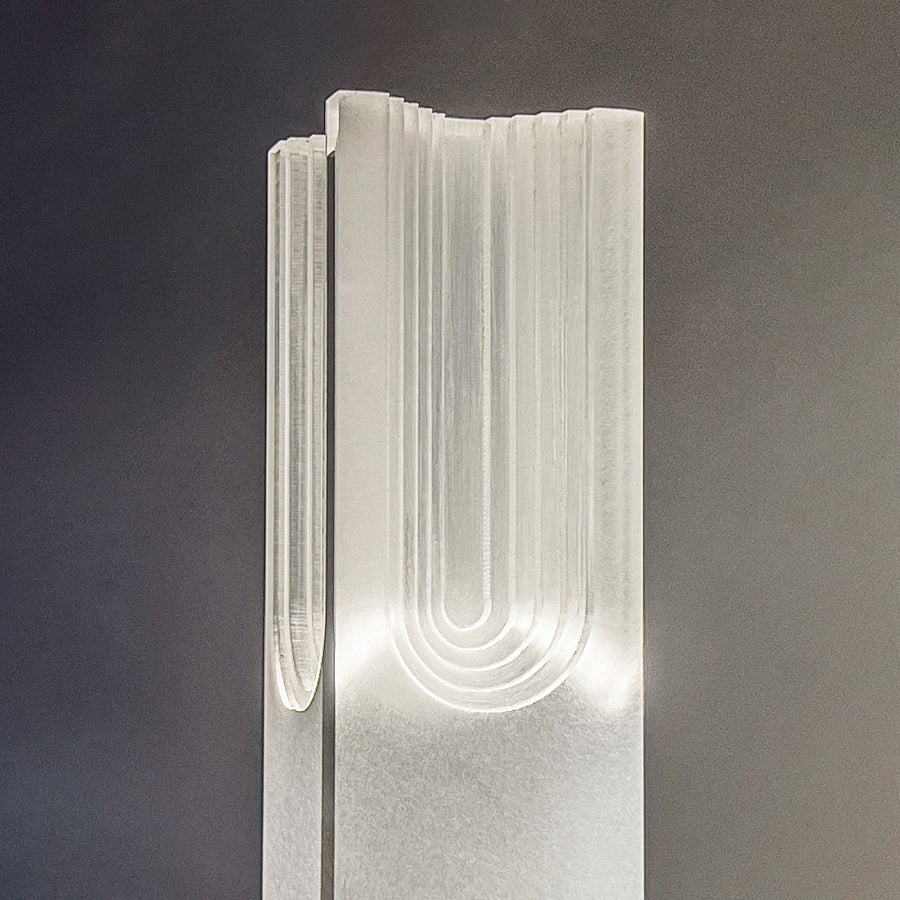  Sculptural acrylic lighting with a mix of matte texture attached to the metal base by architect Yonathan Moore. Represented by Tuleste Factory, an art & design gallery in Chelsea, NYC.