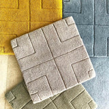 Luxury geometric relief rug by designer Jt/ Pfeiffer. Represented by Tuleste Factory in New York City.