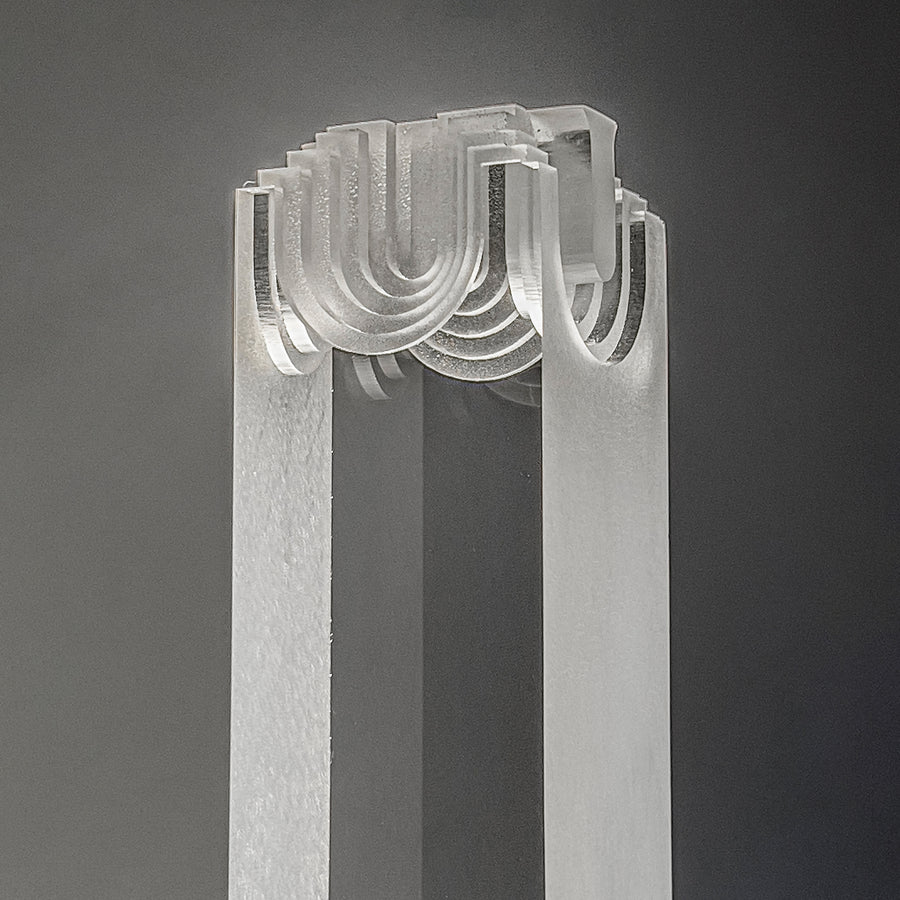 Sculptural acrylic lighting with a mix of matte texture attached to the metal base by architect Yonathan Moore. Represented by Tuleste Factory, an art & design gallery in Chelsea, NYC.