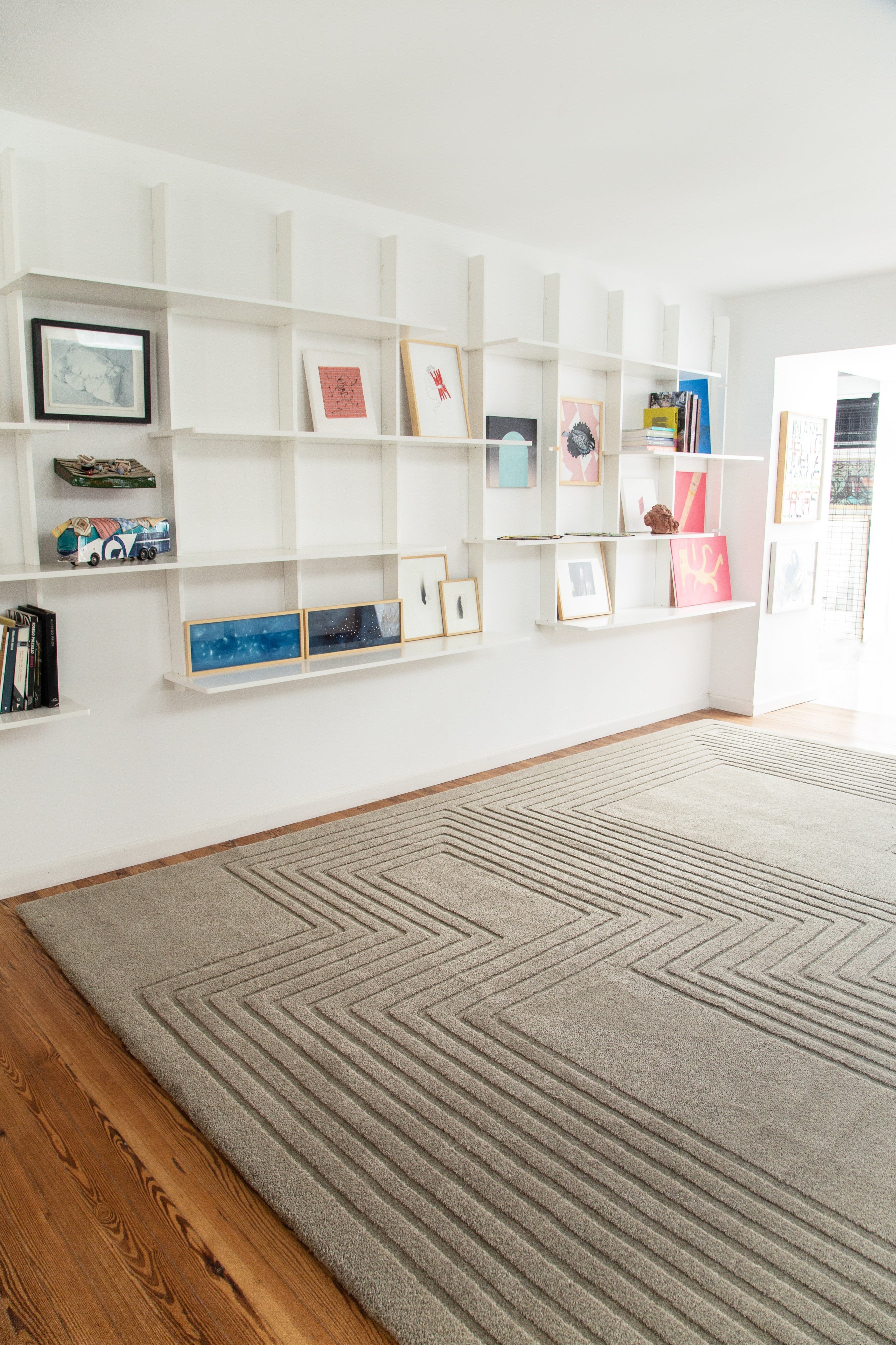 Luxury handcrafted relief rug by designer JT. Pfeiffer. Represented by design gallery Tuleste Factory in New York City.