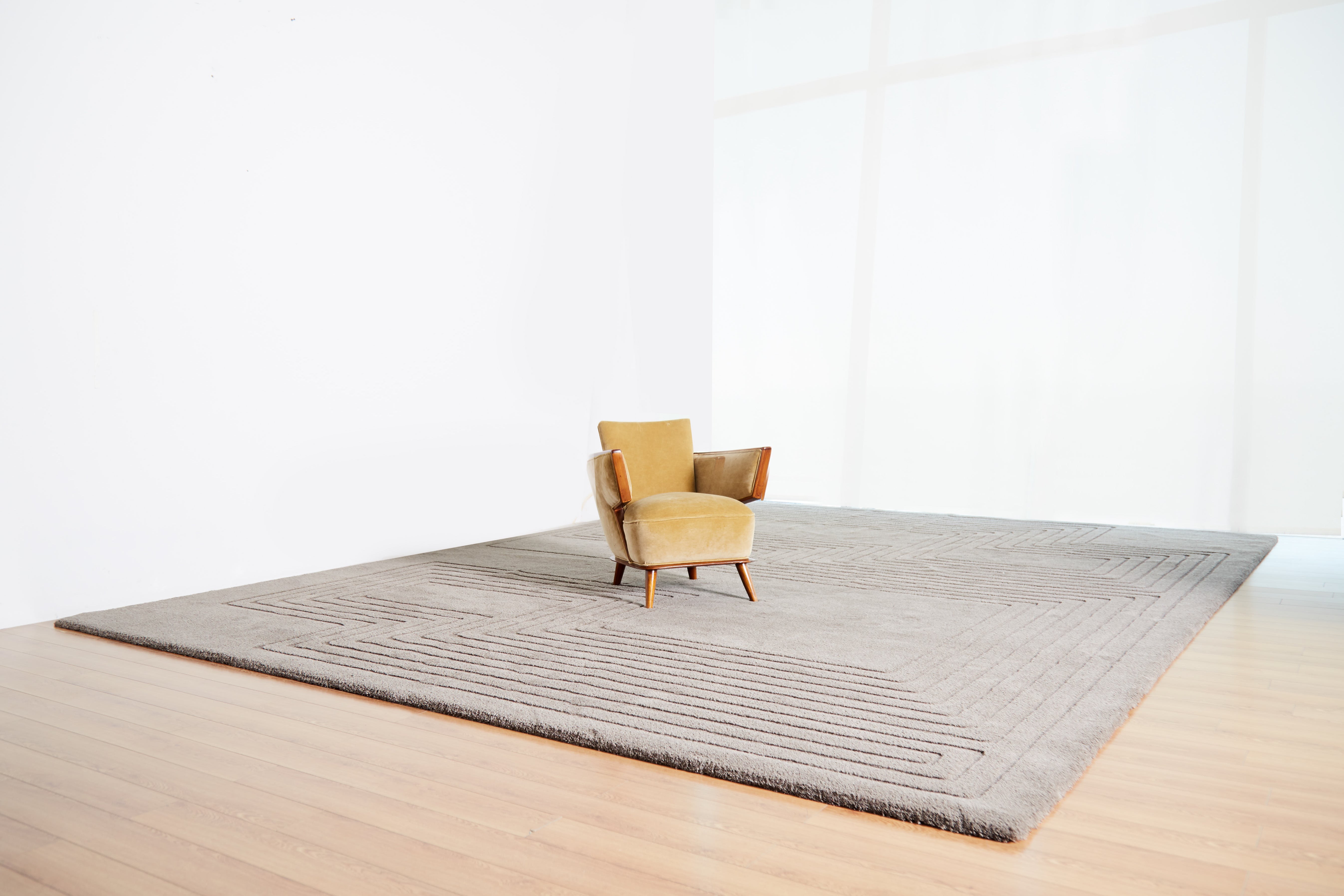 Luxury handcrafted relief rug by designer JT. Pfeiffer. Represented by design gallery Tuleste Factory in New York City.
