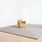 Luxury handcrafted relief rug by designer JT. Pfeiffer. Represented by design gallery Tuleste Factory in New York City.