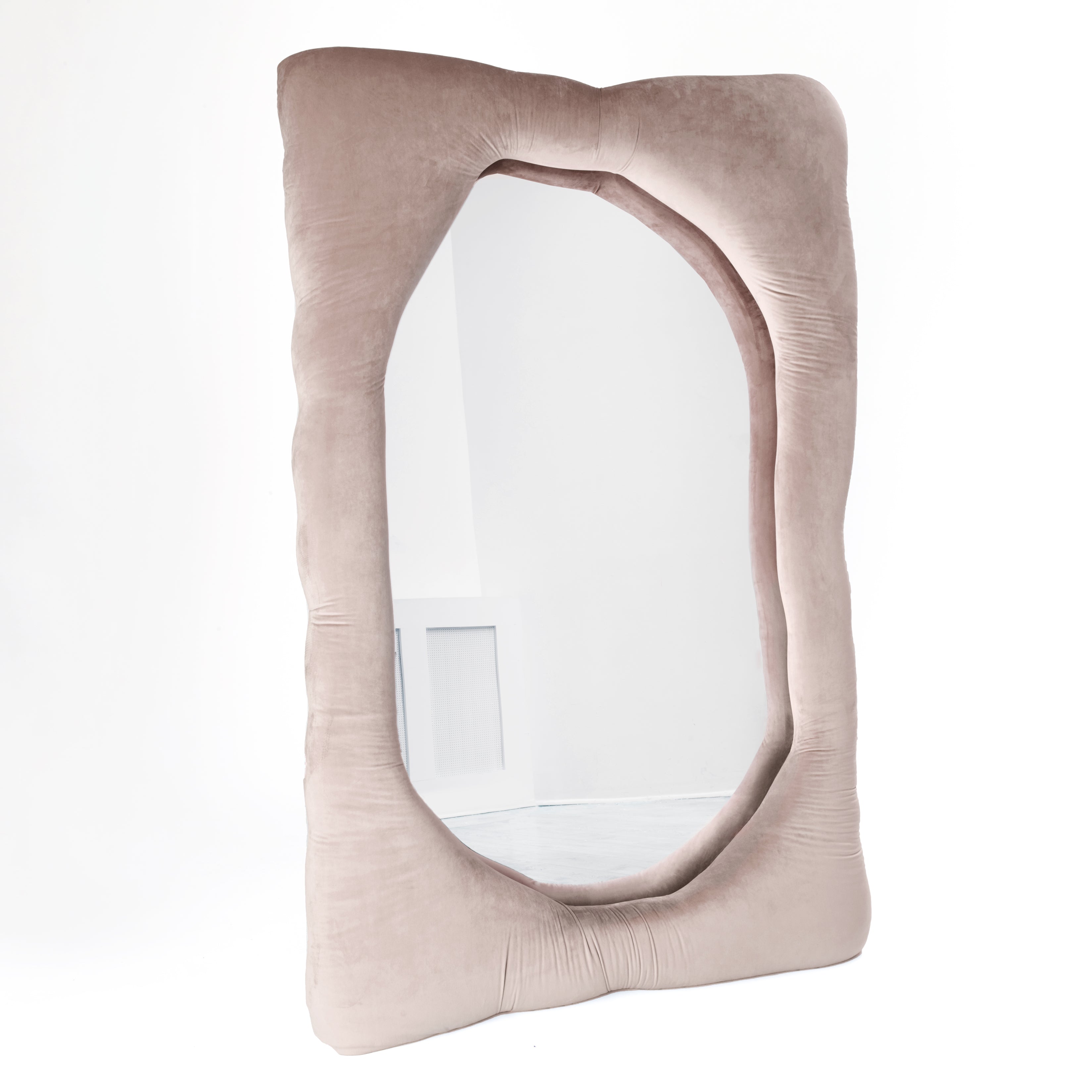 Bespoke velvet mirror in Coral Pink, design by Brandi Howe. Represented by Tuleste Factory, an art & design gallery in Chelsea, New York city.