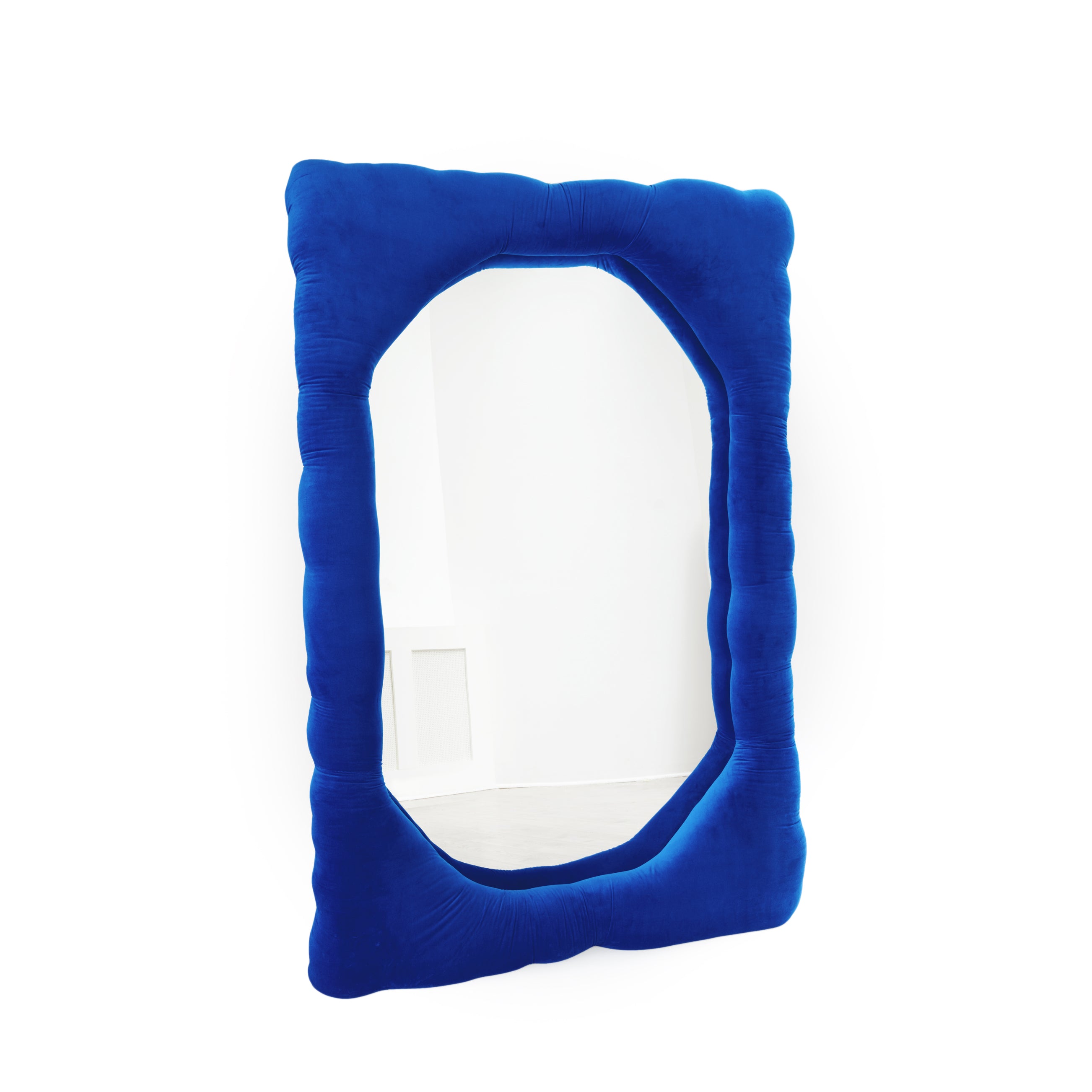 Bespoke mirror design by Brandi Howe. This mirror feature a plush velvet exterior, upholstered on top the wooden structure. Reprsented by Tuleste Factory, an art & design gallery in Chelsea, New York City.