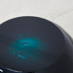 Close up detail of chic and playful side table or transparent resin stool by artist Ian Alistair Cochran. Available through Tuleste Factory in New York City.