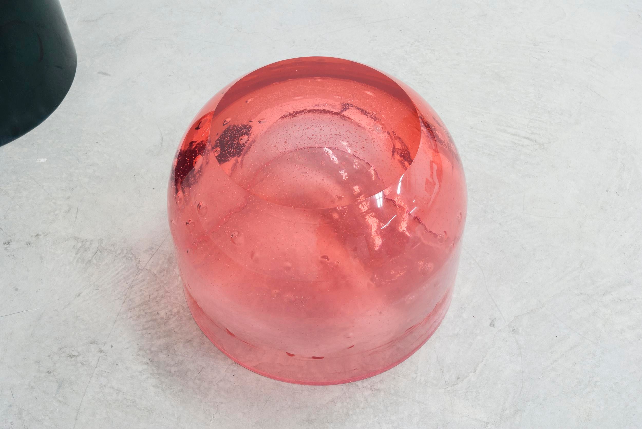 Chic and playful side table or transparent resin stool by artist Ian Alistair Cochran. Available through collectible design gallery Tuleste Factory in New York City.