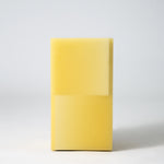 Stool functions as side table, made from resin.