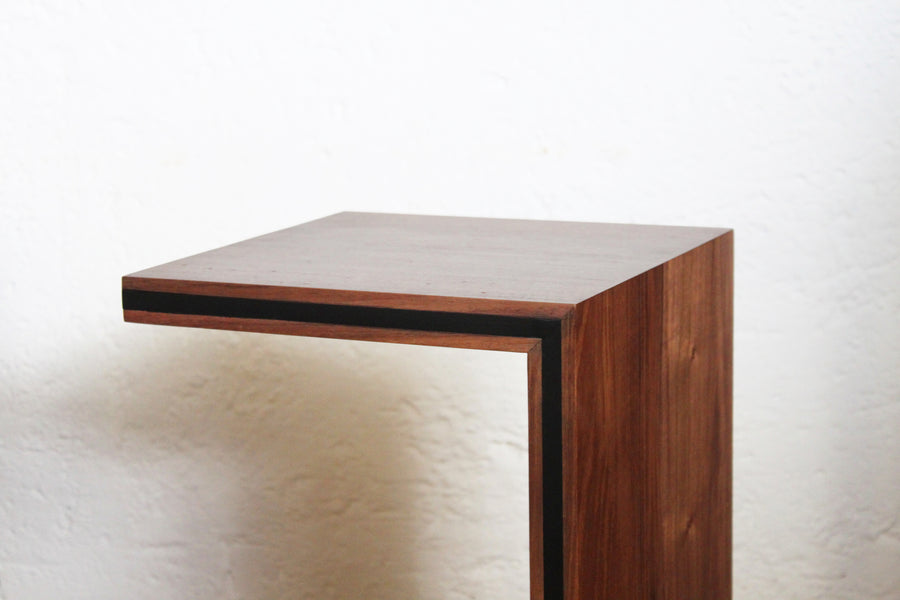 Contemporary handcrafted and minimal side table design by furniture designer Maria Beckmann. Represented by Collectible design gallery Tuleste Factory in New York City.