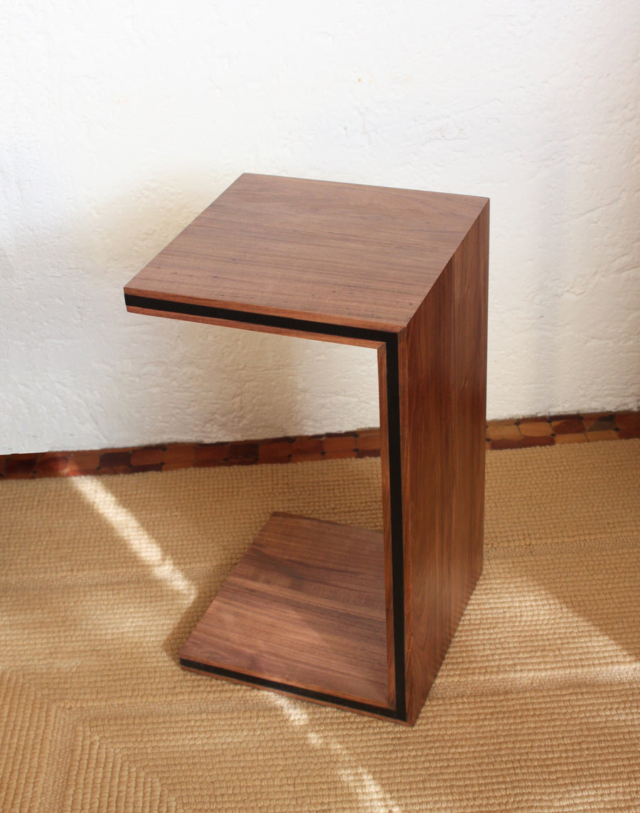 Contemporary handcrafted and minimal side table design by furniture designer Maria Beckmann. Represented by Collectible design gallery Tuleste Factory in New York City.