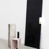 Tall and minimalist hand sculpted side table by artist Bailey Fontaine. Represented by design gallery Tuleste Factory in New York City.