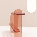 Contemporary and chic transparent resin console in pink by artist Ian Alistair Cochran. Represented by collectible design gallery Tuleste Factory in New York City.