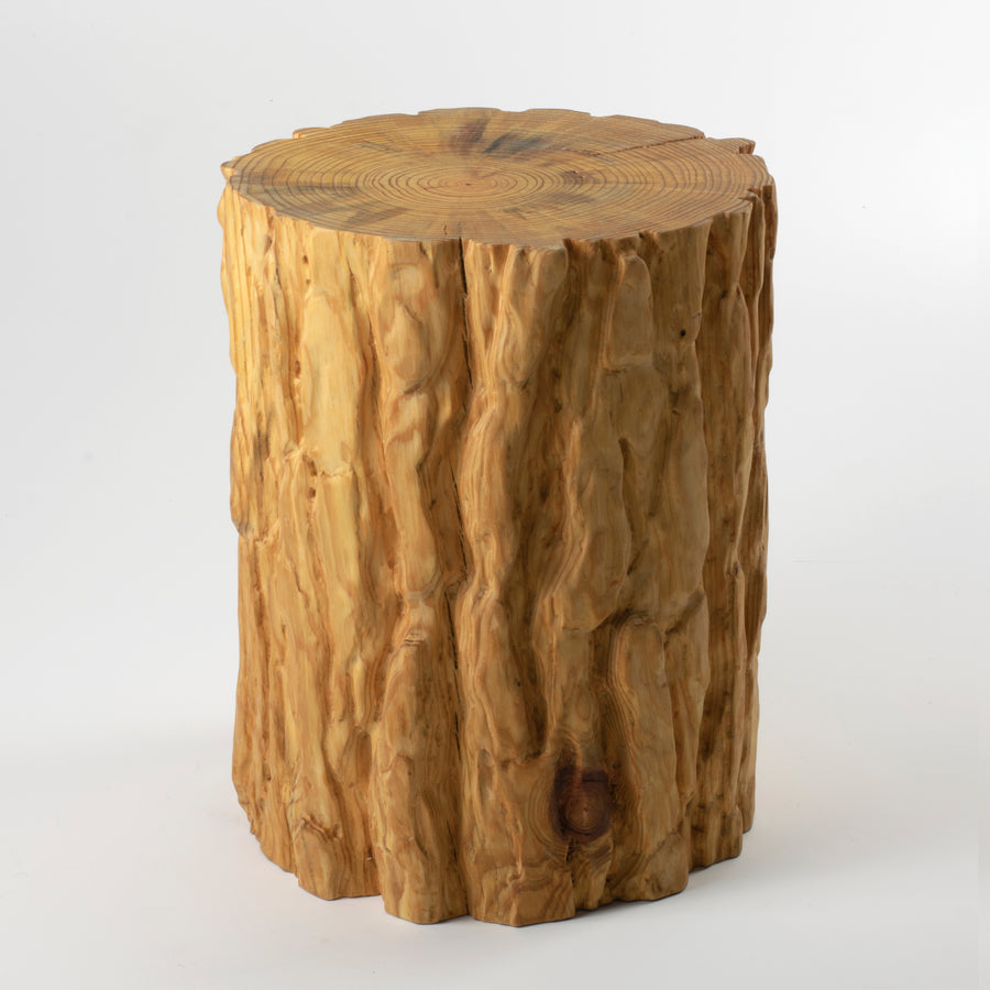 Organic pine stool by design and fabrication studio Timbur. Represented by fine art and design gallery Tuleste Factory in New York City.