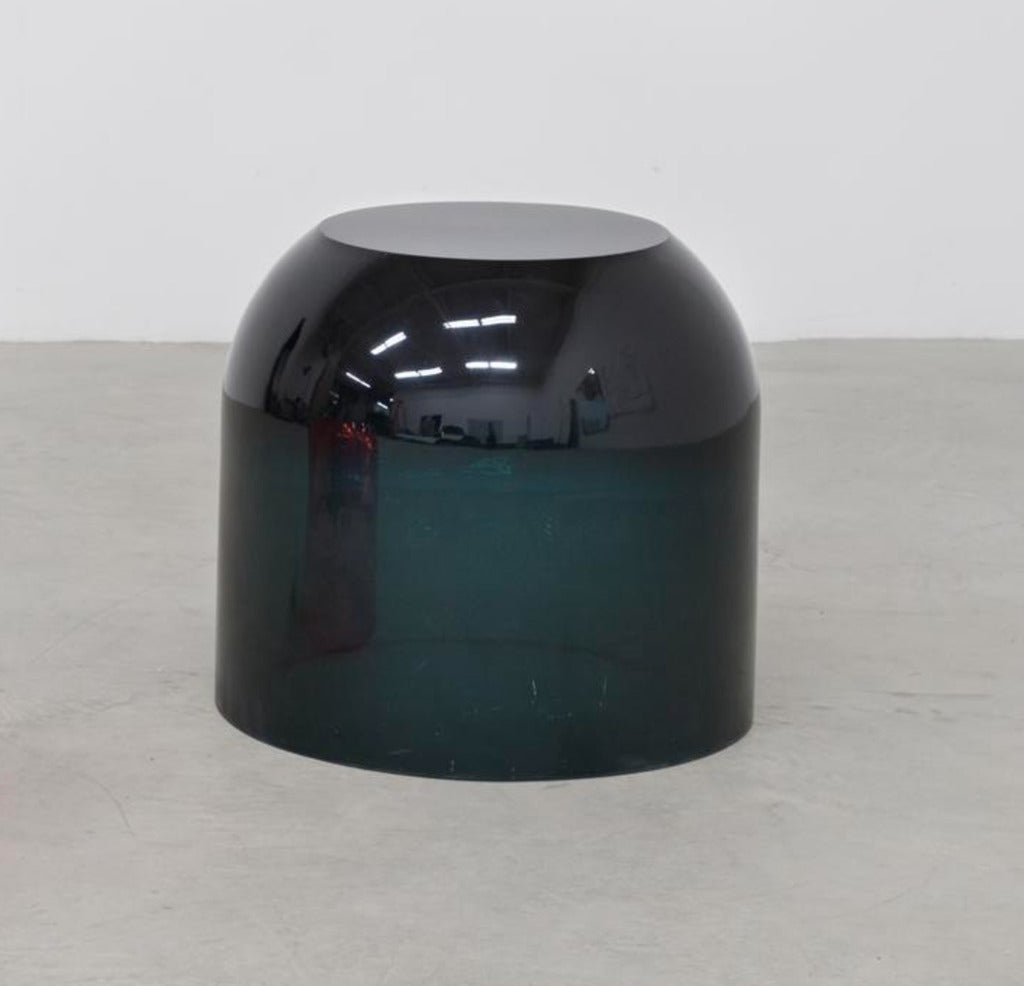 Close up detail of chic and playful side table or transparent resin stool by artist Ian Alistair Cochran. Available through collectible design gallery Tuleste Factory in New York City.
