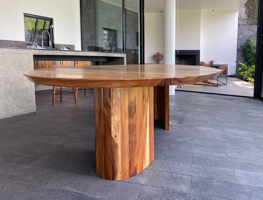 Contemporary wood luxury dining table design by furniture designer Maria Beckmann. Represented by Tuleste Factory, a design gallery in New York City.