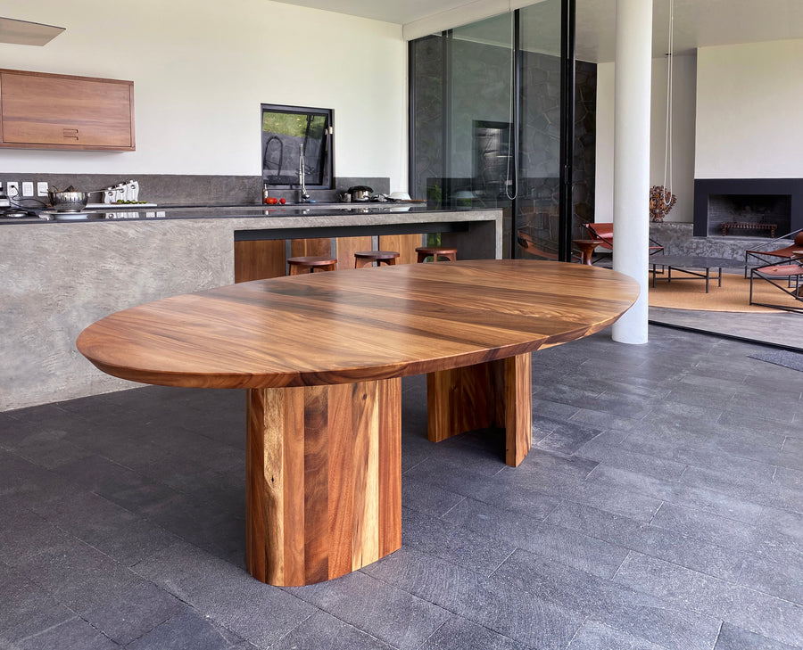 Contemporary wood luxury dining table design by furniture designer Maria Beckmann. Represented by Tuleste Factory, a design gallery in New York City.