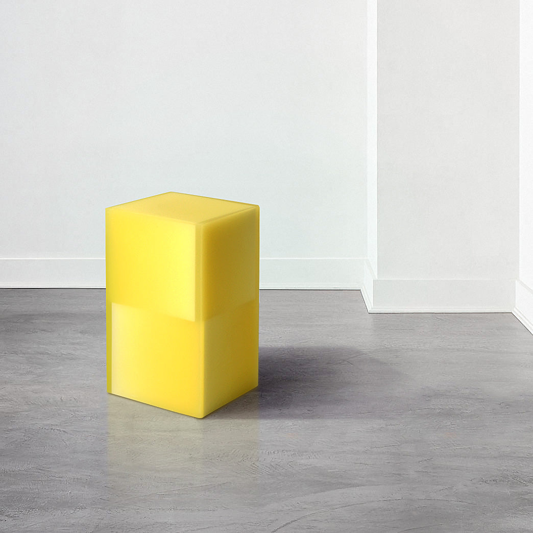 Stool functions as side table, made from resin.