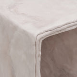 Close up detail of minimalist hand sculpted art side table by artist Bailey Fontaine. Represented by design gallery Tuleste Factory in New York City.