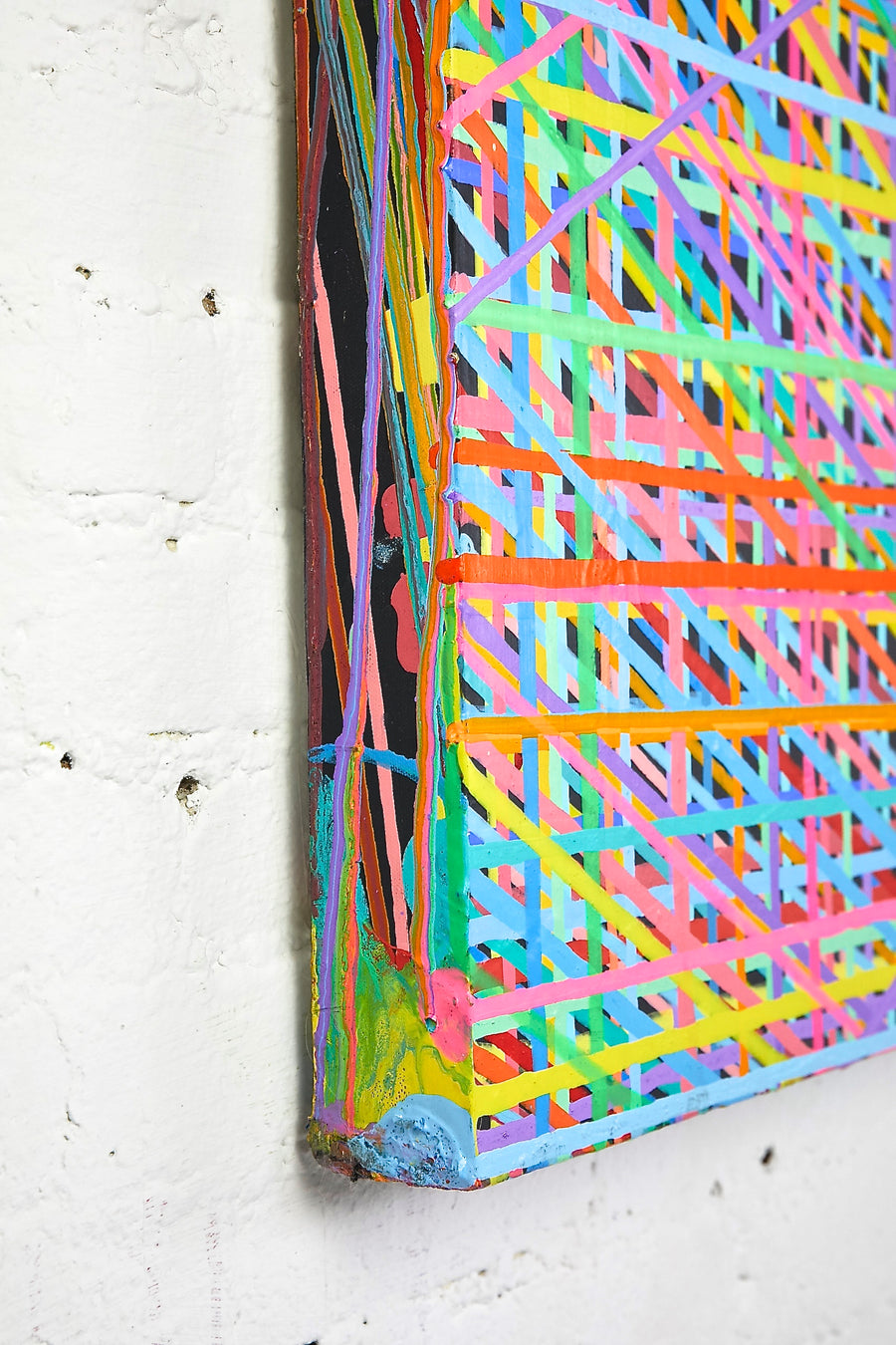 Detail shot of multicolor rainbow abstract drip painting by New York based artist Jon James. Represented by fine art gallery Tuleste Factory in Chelsea, NYC.